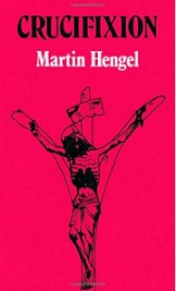 a book called "Crucifixion" with artwork of a man hanging on a cross