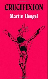 a book called "Crucifixion" with artwork of a man hanging on a cross