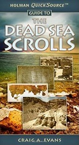 a book called "The Dead Sea Scrolls" with a picture of the caves, the Qumran site and ancient scrolls