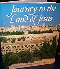 a book called "Journey to the Land of Jesus" with a picture of the eastern wall of the old Jerusalem taken from the Mount of Olives