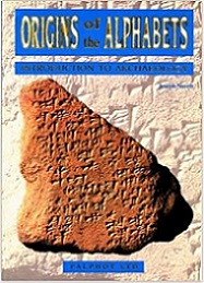 a book called "Origins of the Alphabets" with a picture of a stone carved with ancient text all over it